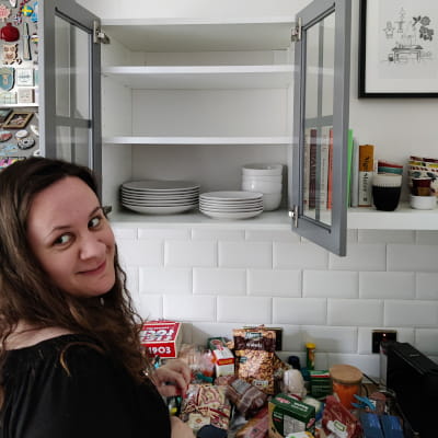 Anna organising kitchen cupboards